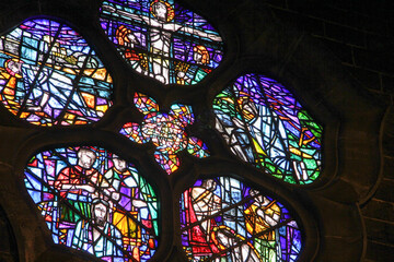 Beautifully colored stained glass windows with drawings inside Galway Cathedral