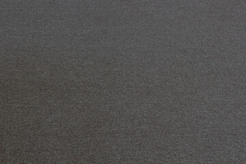 Fototapeta na wymiar Texture of a woolen gray rug.