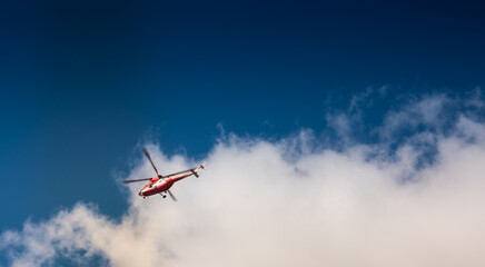 Mountain Rescue helicopter (TOPR - Tatrzanskie Ochotnicze Pogotowie Ratownicze) during emergency callout in Tatra Mountains in Poland