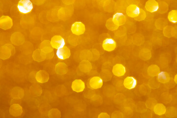 blured golden glitter texture abstract background