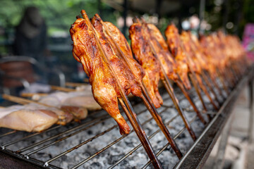 Chicken Grilled in a traditional style, Local foods of Thailand This name is 