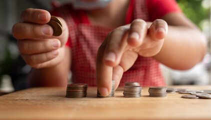 Food vendor woman hands counts the money.In Thailand,saving money or counting money concept.