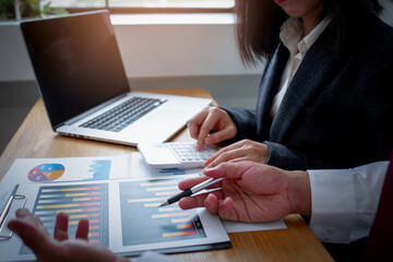 Businessmans working with documents in the office, Focus on woman hands