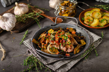 Pork steak with mushrooms and herbs