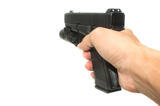 Shooter hand grab on G19 Gen 4th Semi-Auto Pistol attach flashlight, Shooting the 9 mm pistol cartridge.