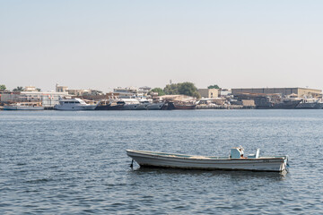 Empty fishing boats on the sea, waiting for its net catch during daytime in the Middle East 