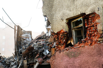 Pile of demolition rubble. Gray rubble at a building site. Concrete rubble debris on construction...