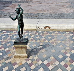 bronze statue dancing faun archaeological excavations  Pompeii Italy