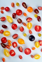 lots of tomatoes on a white background