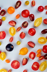lots of tomatoes on a white background