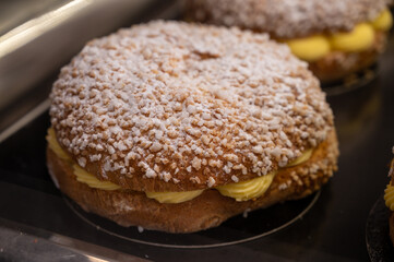 French fresh baked sweet filled brioche pastry tarte tropezienne in confectionery shop in Saint-Tropez, Provence, France