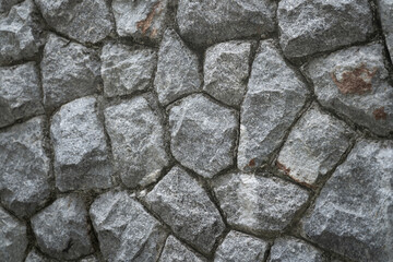 Cobblestone / Rock material background, texture or wallpaper photo.