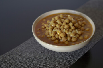 typical vegan dish of legumes with chickpeas, rice and soup 