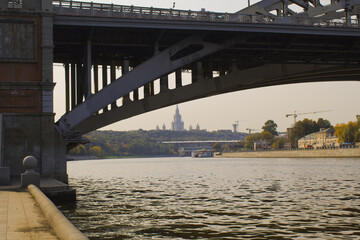 View of the Moscow University from under the Andreevsky bridge over the Moscow river
