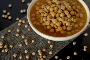 typical vegan dish of legumes with chickpeas, rice and soup 