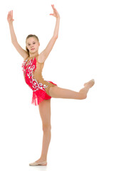 The gymnast balances on one leg.Isolated on white background.