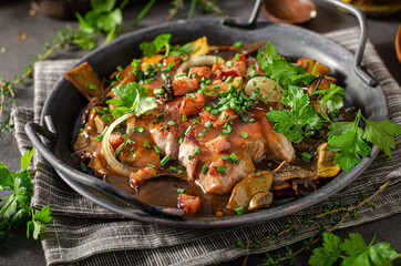 Pork steak with mushrooms and herbs
