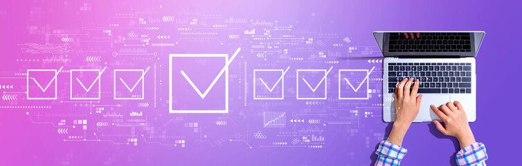 Checklist concept with woman using a laptop computer