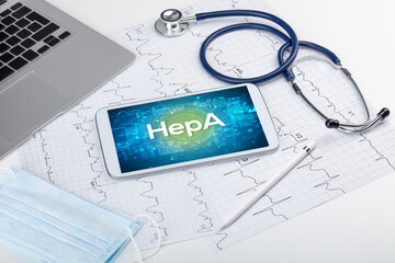 Close-up view of a tablet pc with HepA abbreviation, medical concept
