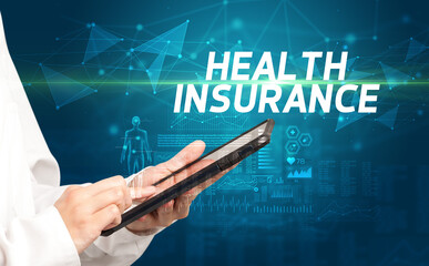 doctor writes notes on the clipboard with HEALTH INSURANCE inscription, medical diagnosis concept