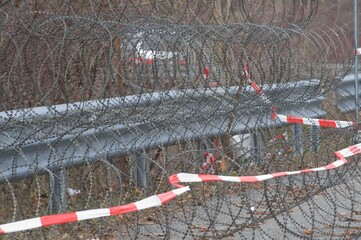 barbed wire fence at the border
