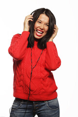 brunette woman with headphones listening music