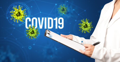 doctor prescribes a prescription with COVID19 inscription, pandemic concept