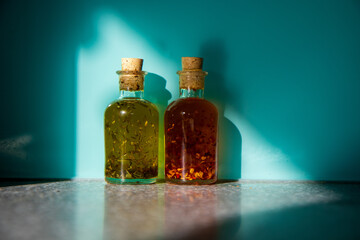 bottle and glass with olive oil chilly tarragon