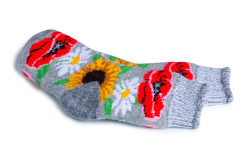 Warm winter socks with floral pattern on white background isolation