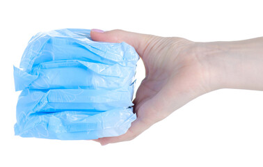 Urological pads diapers in hand on white background isolation