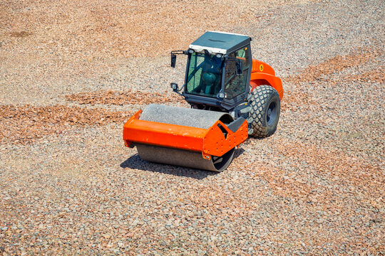 Roller on a construction site leveling