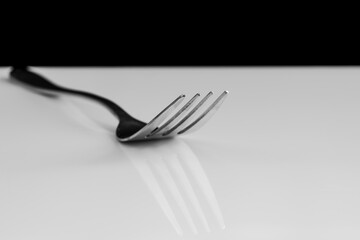 A fork with reflection