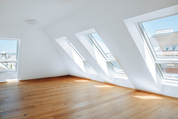 bright empty modern apartment with large windows 
