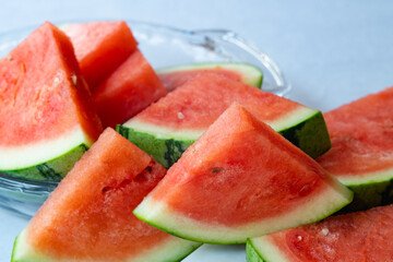 Watermelon slices close up on kitchen table