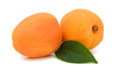 yellow plums with leaves isolated on white