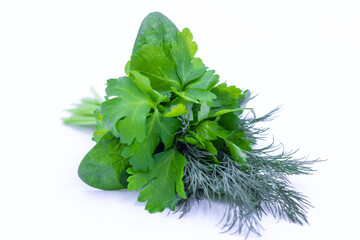 A bunch of fresh herbs. Dill, parsley, spinach. White background. Close-up.
