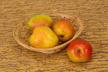 Pear heap in the wooden basket
