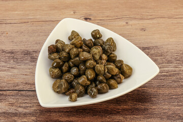 Tasty capers in the bowl