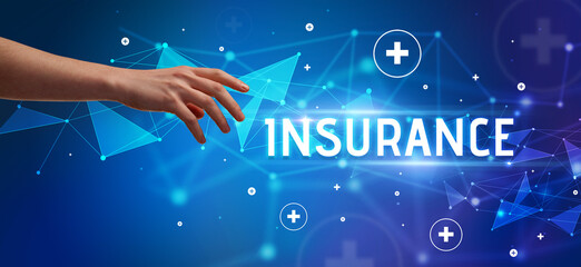 Close-Up of cropped hand pointing at INSURANCE inscription, medical concept