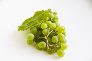 green grapes isolated on white background raisins with grape leaf