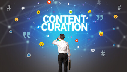 Rear view of a businessman with CONTENT CURATION inscription, social networking concept