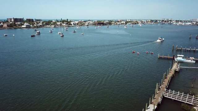Aerial, pov, boats on the waters of Matanzas Harbor, Fort Myers Beach, Florida