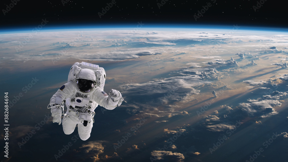 Sticker astronaut walking in space with earth background. elements of this image furnished by nasa