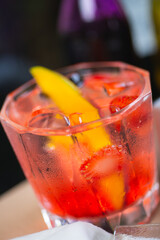 glass with a refreshing drink on the table in a restaurant.