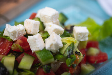 Fresh salad from chopped vegetables.