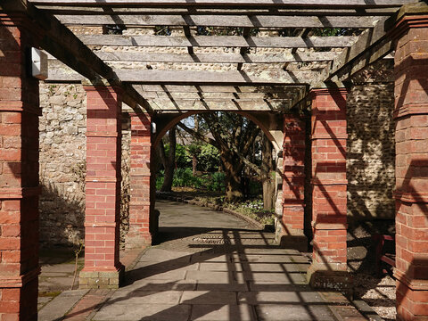 Perspective view of a brick wooden architecture vintage traditional pavilion in a garden