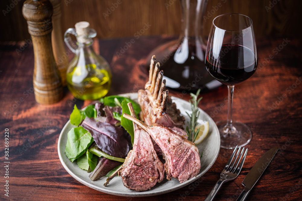 Wall mural roasted lamb rack with red wine