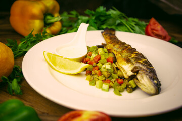 rainbow trout on a vegetable pillow