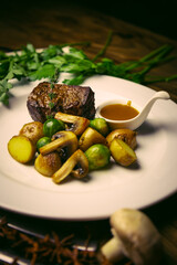 Beef medallion with mushrooms and Brussels sprouts