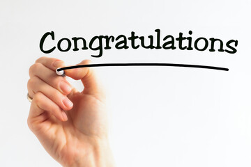 Hand writing inscription CONGRATULATIONS with marker, concept